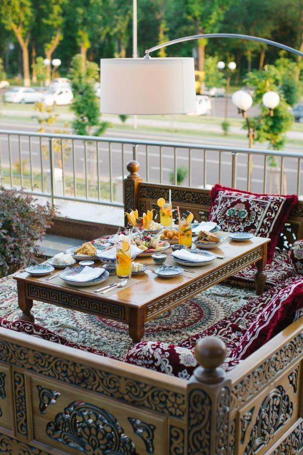 Hyatt Regency Tashkent Hotel Exterior photo A traditional Azerbaijani table with traditional Azerbaijani cuisine